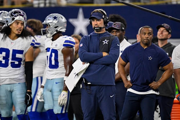 Dallas Cowboys head coach Brian Schottenheimer looks on from the sidelines. 