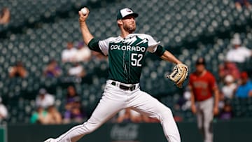 Aug 16, 2023; Denver, Colorado, USA; Colorado Rockies relief pitcher Daniel Bard (52) pitches in the ninth inning against the Arizona Diamondbacks at Coors Field. Mandatory Credit: Isaiah J. Downing-Imagn Images