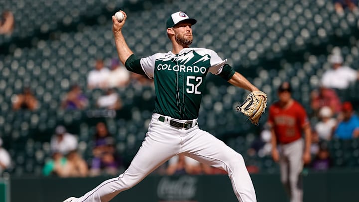 Aug 16, 2023; Denver, Colorado, USA; Colorado Rockies relief pitcher Daniel Bard (52) pitches in the ninth inning against the Arizona Diamondbacks at Coors Field. Mandatory Credit: Isaiah J. Downing-Imagn Images