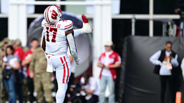 Nov 15, 2025; Bloomington, Indiana, USA; Wisconsin Badgers linebacker Darryl Peterson (17) celebrates a sack during the second quarter against the Indiana Hoosiers at Memorial Stadium. Mandatory Credit: Marc Lebryk-Imagn Images