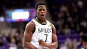 Mar 4, 2025; Fort Worth, Texas, USA;  Baylor Bears guard VJ Edgecombe (7) reacts against the TCU Horned Frogs during the first half at Ed and Rae Schollmaier Arena. Mandatory Credit: Kevin Jairaj-Imagn Images
