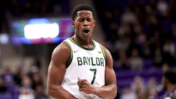 Mar 4, 2025; Fort Worth, Texas, USA;  Baylor Bears guard VJ Edgecombe (7) reacts against the TCU Horned Frogs during the first half at Ed and Rae Schollmaier Arena. Mandatory Credit: Kevin Jairaj-Imagn Images