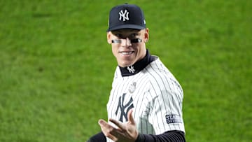 Oct 29, 2024; Bronx, New York, USA; New York Yankees outfielder Aaron Judge (99) reacts with fans against the Los Angeles Dodgers in the first inning during game four of the 2024 MLB World Series at Yankee Stadium. Mandatory Credit: Robert Deutsch-Imagn Images