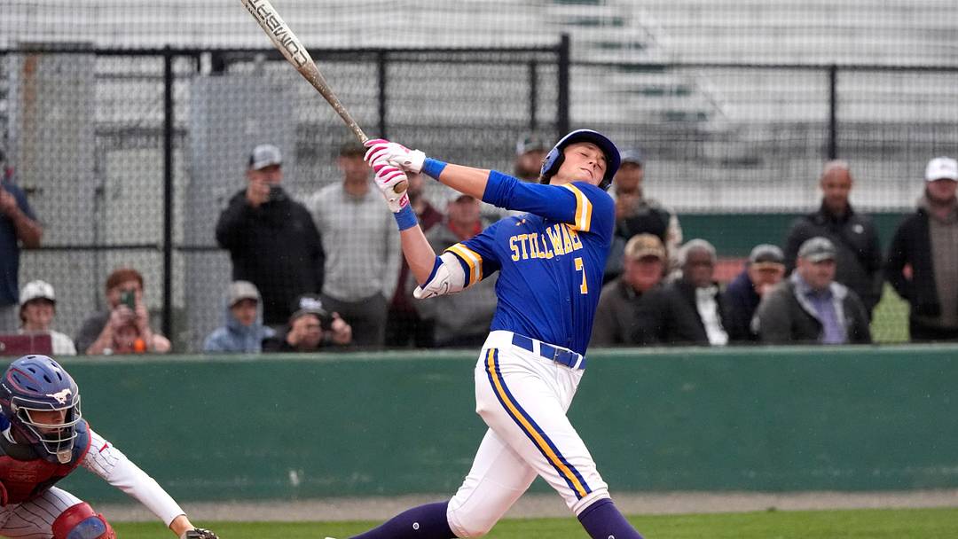 Stillwater's Ethan Holliday swings during the high school baseball game between Fort Cobb-Broxton and Stillwater.