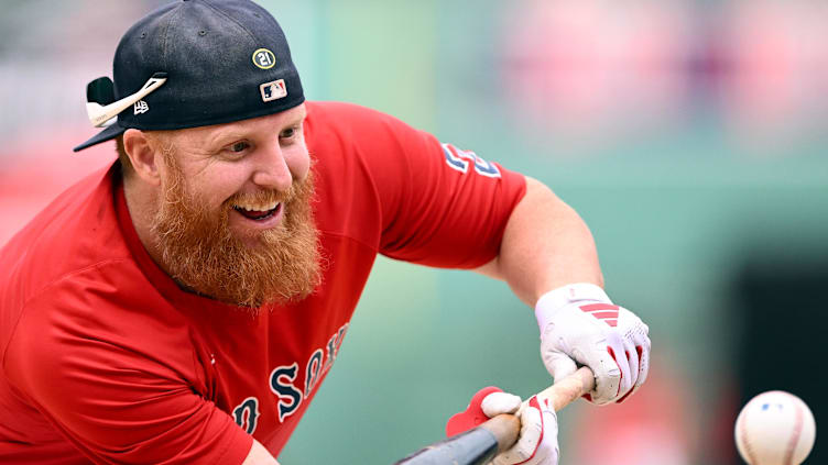 Sep 8, 2023; Boston, Massachusetts, USA; Boston Red Sox designated hitter Justin Turner (2) bunts