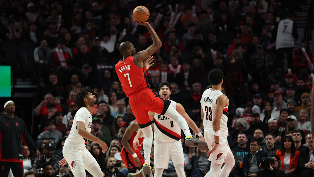 Jan 7, 2026; Portland, Oregon, USA;  Houston Rockets forward Kevin Durant (7) shoots the ball over Portland Trail Blazers forward Toumani Camara (33) during the second half at Moda Center. Mandatory Credit: Jaime Valdez-Imagn Images