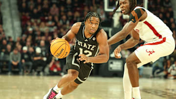 Jan 29, 2025; Starkville, Mississippi, USA; Mississippi State Bulldogs guard Josh Hubbard (12) drives to the basket against the Alabama Crimson Tide during the second half at Humphrey Coliseum. Mandatory Credit: Wesley Hale-Imagn Images