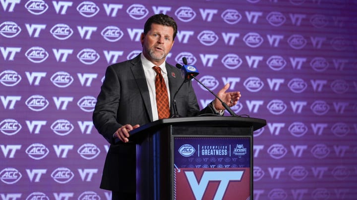 Jul 23, 2024; Charlotte, NC, USA; Virginia Tech head coach Brent Pry answers questions from the media during the ACC Kickoff at Hilton Charlotte Uptown. Mandatory Credit: Jim Dedmon-USA TODAY Sports