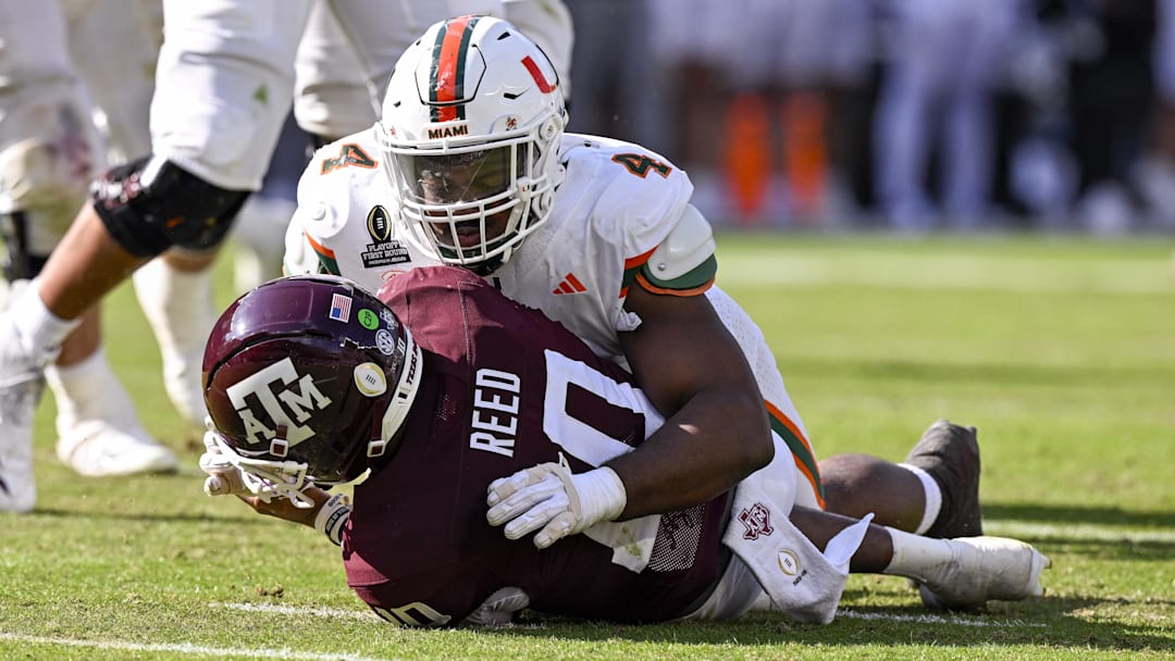 Dec 20, 2025; College Station, TX, USA; Miami Hurricanes defensive lineman Rueben Bain Jr. (4) sacks Texas A&M Aggies quarterback Marcel Reed (10) during the game between the Aggies and the Hurricanes at Kyle Field. Mandatory Credit: Jerome Miron-Imagn Images