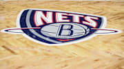 Nov 17, 2021; Brooklyn, New York, USA; The old Nets logo on the court prior to the game between the Cleveland Cavilers and the Brooklyn Nets at Barclays Center. Mandatory Credit: Wendell Cruz-Imagn Images