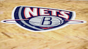Nov 17, 2021; Brooklyn, New York, USA; The old Nets logo on the court prior to the game between the Cleveland Cavilers and the Brooklyn Nets at Barclays Center. Mandatory Credit: Wendell Cruz-Imagn Images