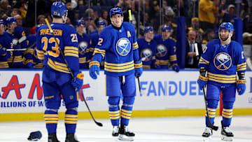Apr 6, 2025; Buffalo, New York, USA;  Buffalo Sabres center Tage Thompson (72) celebrates his third goal of the game with teammates during the third period against the Boston Bruins at KeyBank Center. Mandatory Credit: Timothy T. Ludwig-Imagn Images