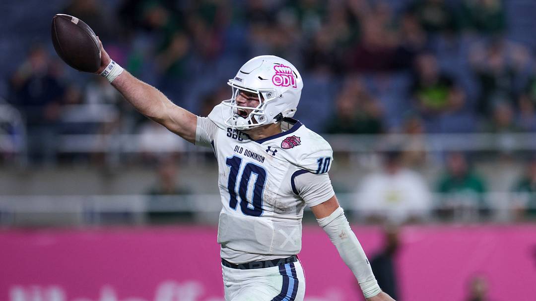Dec 17, 2025; Orlando, FL, USA; Old Dominion Monarchs quarterback Quinn Henicle (10) runs into the end-zone for a touchdown against the South Florida Bulls in the fourth quarterduring the Cure Bowl at Camping World Stadium. Mandatory Credit: Nathan Ray Seebeck-Imagn Images Dec 17, 2025; Orlando, FL, USA; Old Dominion Monarchs quarterback Quinn Henicle (10) runs into the end-zone for a touchdown against the South Florida Bulls in the fourth quarterduring the Cure Bowl at Camping World Stadium. Mandatory Credit: Nathan Ray Seebeck-Imagn Images