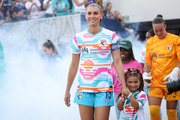 Alex Morgan and Charlie Carrasco
