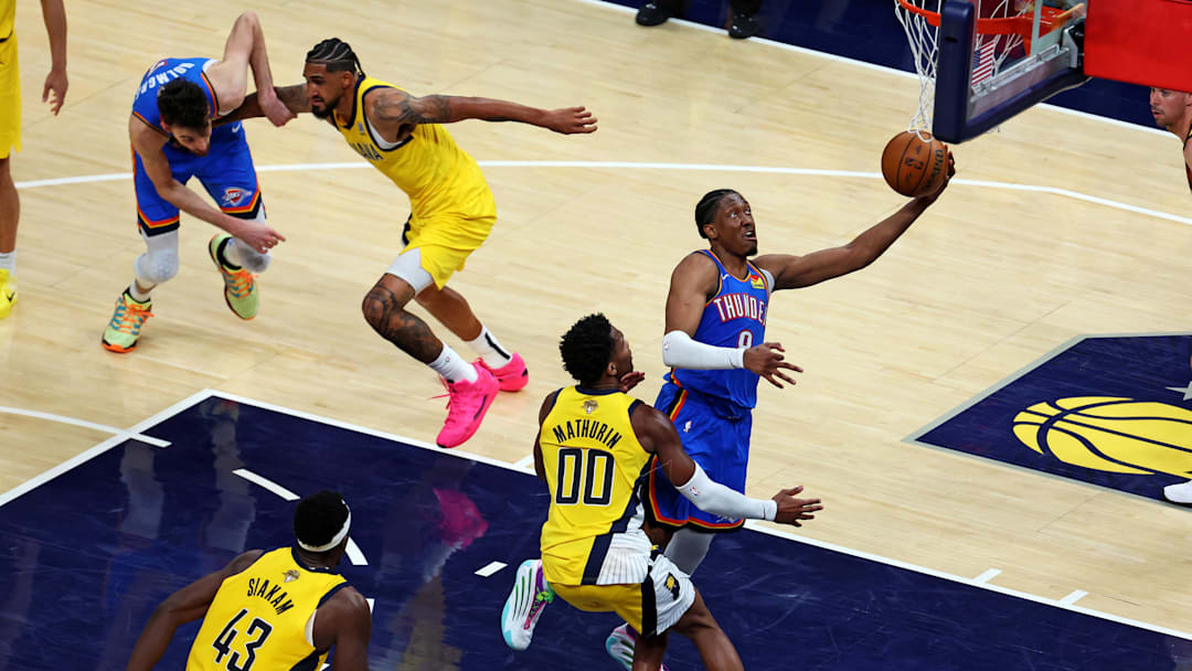 Jun 11, 2025; Indianapolis, Indiana, USA; Oklahoma City Thunder forward Jalen Williams (8) shoots the ball against Indiana Pacers guard Bennedict Mathurin (00) during the fourth quarter in game three of the 2025 NBA Finals at Gainbridge Fieldhouse. Mandatory Credit: Trevor Ruszkowski-Imagn Images