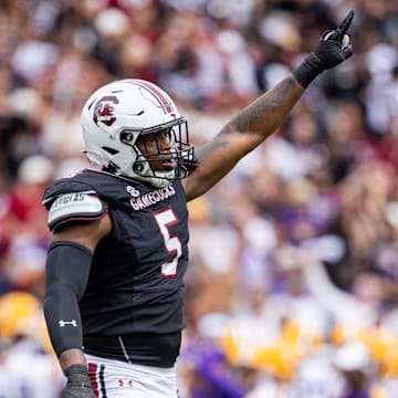 Sep 14, 2024; Columbia, South Carolina, USA; South Carolina Gamecocks edge Kyle Kennard (5) celebrates after a fourth down stop against the LSU Tigers in the third quarter at Williams-Brice Stadium. Mandatory Credit: Scott Kinser-Imagn Images