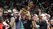 Jun 17, 2024; Boston, Massachusetts, USA; Boston Celtics head coach Joe Mazzulla holds up the trophy as he celebrates after winning the 2024 NBA Finals against the Dallas Mavericks at TD Garden. Mandatory Credit: Peter Casey-USA TODAY Sports