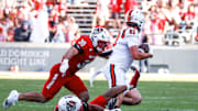 Oct 4, 2025; Raleigh, North Carolina, USA;  Campbell Fighting Camels tight end Dawson Adams-Grenier (80) runs with the football during the second half of the game against NC State Wolfpack at Carter-Finley Stadium. Mandatory Credit: Jaylynn Nash-Imagn Images