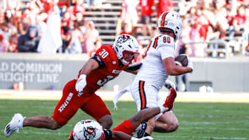 Oct 4, 2025; Raleigh, North Carolina, USA;  Campbell Fighting Camels tight end Dawson Adams-Grenier (80) runs with the football during the second half of the game against NC State Wolfpack at Carter-Finley Stadium. Mandatory Credit: Jaylynn Nash-Imagn Images