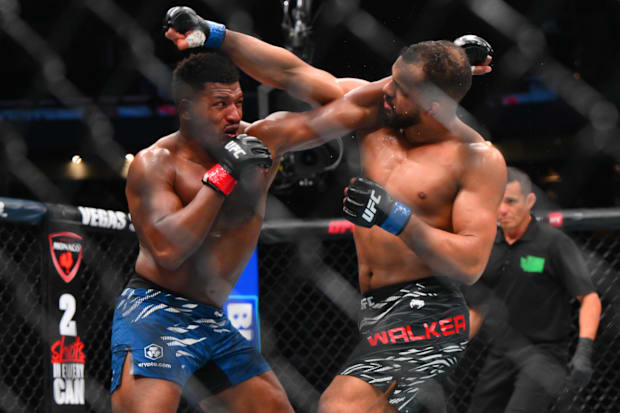 Alonzo Menifield (red gloves) fights Julius Walker (blue gloves) in the light heavyweight bout during UFC Fight Night.