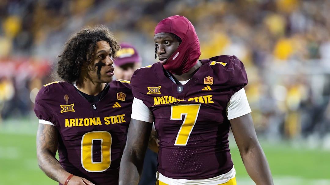 Nov 28, 2025; Tempe, Arizona, USA; Arizona State Sun Devils wide receiver Jordyn Tyson (0) with tight end Chamon Metayer (7) against the Arizona Wildcats during the 99th Territorial Cup at Mountain America Stadium. Mandatory Credit: Mark J. Rebilas-Imagn Images