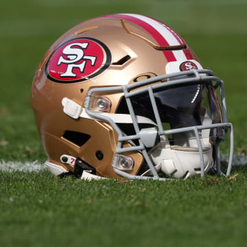 Dec 10, 2023; Santa Clara, California, USA; A San Francisco 49ers helmet sits on the field before the game against the Seattle Seahawks at Levi's Stadium. Mandatory Credit: Darren Yamashita-USA TODAY Sports