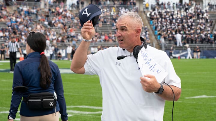 Oct 16, 2021; East Hartford, Connecticut, USA; Yale Bulldogs head coach Tony Reno looks up at the scoreboard during the first half against the Connecticut Huskies at Rentschler Field at Pratt & Whitney Stadium. Mandatory Credit: Gregory Fisher-Imagn Images