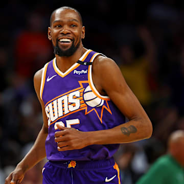 Mar 24, 2025; Phoenix, Arizona, USA; Phoenix Suns forward Kevin Durant (35) celebrates after a play during the fourth quarter against the Milwaukee Bucks at Footprint Center. Mandatory Credit: Mark J. Rebilas-Imagn Images