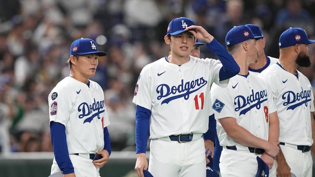 Mar 16, 2025; Bunkyo, Tokyo, Japan; Los Angeles Dodgers pitcher Yoshinobu Yamamoto (left) and pitcher Roki Sasaki (11) stand on the field before the game against the Hanshin Tigers at Tokyo Dome. Mandatory Credit: Darren Yamashita-Imagn Images Mar 16, 2025; Bunkyo, Tokyo, Japan; Los Angeles Dodgers pitcher Yoshinobu Yamamoto (left) and pitcher Roki Sasaki (11) stand on the field before the game against the Hanshin Tigers at Tokyo Dome. Mandatory Credit: Darren Yamashita-Imagn Images