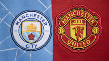 The Manchester City and Manchester United Club Badges