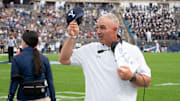 Oct 16, 2021; East Hartford, Connecticut, USA; Yale Bulldogs head coach Tony Reno looks up at the scoreboard during the first half against the Connecticut Huskies at Rentschler Field at Pratt & Whitney Stadium. Mandatory Credit: Gregory Fisher-Imagn Images