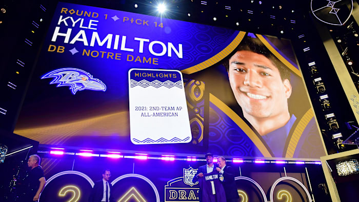 Apr 28, 2022; Las Vegas, NV, USA; Notre Dame safety Kyle Hamilton with NFL commissioner Roger
