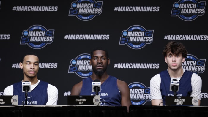 Gonzaga guard Nolan Hickman, forward Graham Ike and forward Braden Huff (far right) meet with the media.