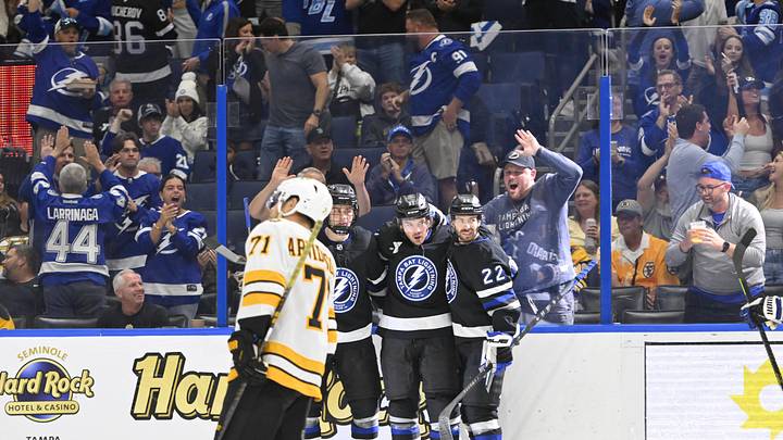 Apr 4, 2026; Tampa, Florida, USA; Tampa Bay Lightning teammates celebrate a goal during the third period against Boston Bruins at Benchmark International Arena. Mandatory Credit: Pablo Robles-Imagn Images