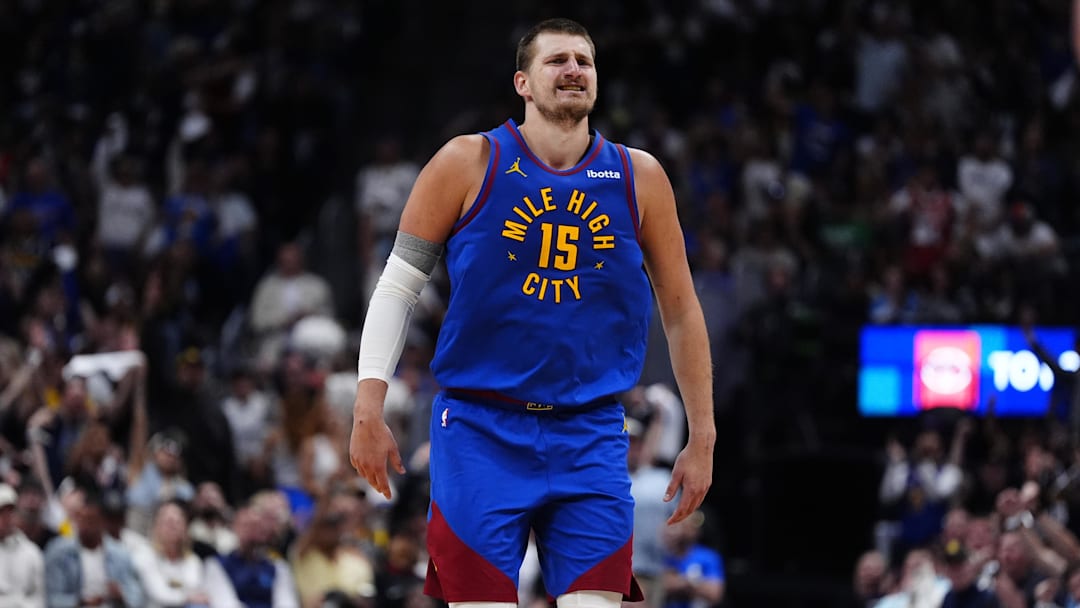 May 9, 2025; Denver, Colorado, USA; Denver Nuggets center Nikola Jokic (15) reacts in the fourth quarter against the Oklahoma City Thunder during game three of the second round for the 2025 NBA Playoffs at Ball Arena. Mandatory Credit: Ron Chenoy-Imagn Images