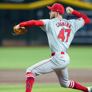 Jun 13, 2024; Phoenix, Arizona, USA; Los Angeles Angels pitcher Griffin Canning (47) pitches against the Arizona Diamondbacks during the first inning at Chase Field. Mandatory Credit: Joe Camporeale-USA TODAY Sports