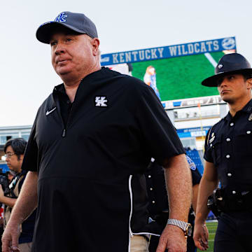 Sep 7, 2024; Lexington, Kentucky, USA; Kentucky Wildcats head coach Mark Stoops walks off the field after the game against the South Carolina Gamecocks at Kroger Field. Mandatory Credit: Jordan Prather-Imagn Images