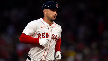 Boston Red Sox third baseman Alex Bregman (2) runs the bases after hitting a solo home run against the Texas Rangers during the fourth inning at Fenway Park.