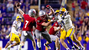 Sep 7, 2024; Baton Rouge, Louisiana, USA; Nicholls State Colonels quarterback Pat McQuaide (7) passes over LSU Tigers safety Dashawn Spears (10) during the second half at Tiger Stadium. Mandatory Credit: Stephen Lew-Imagn Images