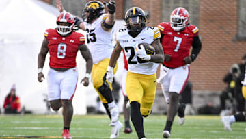 Nov 23, 2024; College Park, Maryland, USA;  Iowa Hawkeyes running back Kamari Moulton (28) runs for a touchdown during the second  half against the Maryland Terrapins at SECU Stadium. Mandatory Credit: Tommy Gilligan-Imagn Images