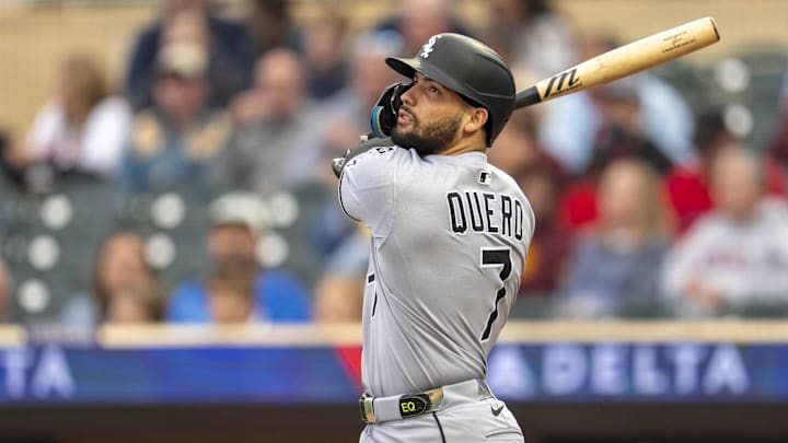 Sep 3, 2025; Minneapolis, Minnesota, USA; Chicago White Sox catcher Edgar Quero (7) hits a solo home run against the Minnesota Twins in the second inning at Target Field. Mandatory Credit: Jesse Johnson-Imagn Images