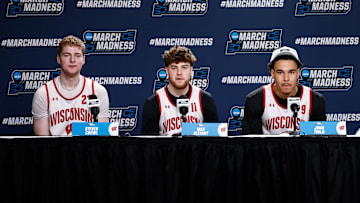 Mar 19, 2025; Denver, CO, USA; (from left to right) Wisconsin Badgers players Steven Crowl and Max Klesmit and John Tonje during a press conference at Ball Arena. Mandatory Credit: Isaiah J. Downing-Imagn Images