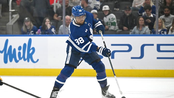 Oct 14, 2025; Toronto, Ontario, CAN;   Toronto Maple Leafs forward William Nylander (88) shoots the puck against the Nashville Predators in the third period at Scotiabank Arena. Mandatory Credit: Dan Hamilton-Imagn Images