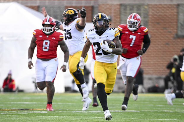Iowa Hawkeyes running back Kamari Moulton (28) runs for a touchdown during the second  half against the Maryland Terrapins.