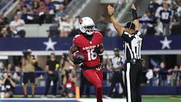 Nov 3, 2025; Arlington, Texas, USA; Arizona Cardinals wide receiver Marvin Harrison Jr. (18) scores a touchdown against the Dallas Cowboys in the first half at AT&;T Stadium. Mandatory Credit: Kevin Jairaj-Imagn Images