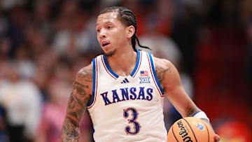 Kansas Jayhawks guard Tre White (3) dribbles up court during the first half of the exhibition game against Fort Hays State Tigers inside Allen Fieldhouse on Tuesday, October, 28, 2025.