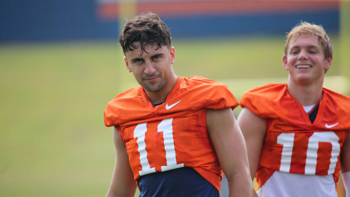 The battle between Tony Muskett and Anthony Colandrea for Virginia's starting quarterback job continues. 