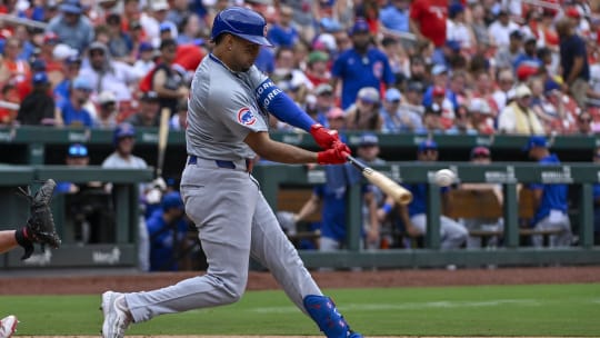 Jul 14, 2024; St. Louis, Missouri, USA;  Chicago Cubs designated hitter Christopher Morel (5) hits a solo home run against the St. Louis Cardinals during the eighth inning at Busch Stadium. 
