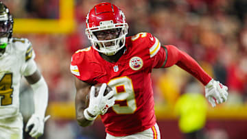 Kansas City Chiefs wide receiver JuJu Smith-Schuster (9) runs with the ball during the first half against the New Orleans Saints at GEHA Field at Arrowhead Stadium.