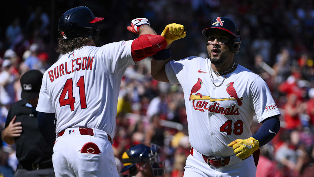 Sep 21, 2025; St. Louis, Missouri, USA; St. Louis Cardinals designated hitter Ivan Herrera (48) celebrates with first baseman Alec Burleson (41) after hitting a two run home run against the Milwaukee Brewers during the third inning at Busch Stadium. Mandatory Credit: Jeff Curry-Imagn Images